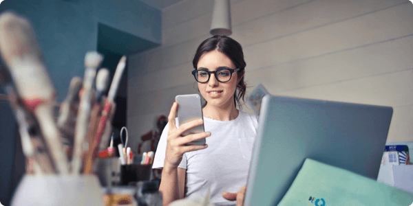 A women with a smartphone using Accessibly App on Squarespace